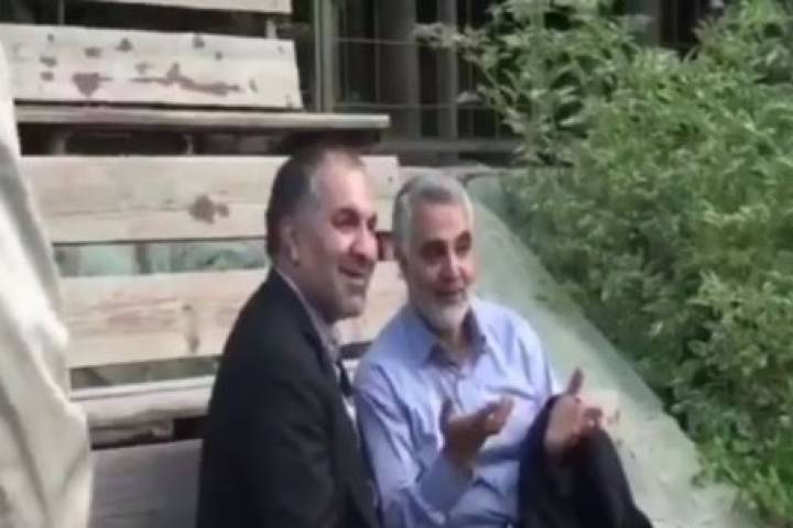 martyr Hajj Qasem Soleimani on the sidelines of the football field, watching his Kermani comrades play